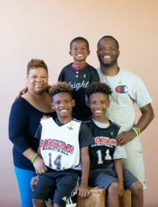 Pictured clockwise from left: Braxton's mother, Loretta; nephew Jacobe, Jr.; brother, Jacobe; and nephews Jayden and Jaylen Woods