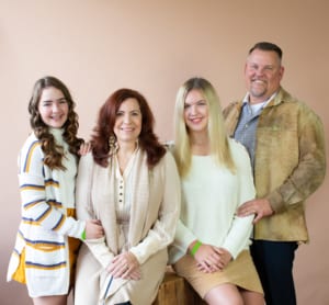 Pictured: Recipient Olivia (second from right) with her sister, Millie; mother, Jodi; and father, Rod Eisenhauer