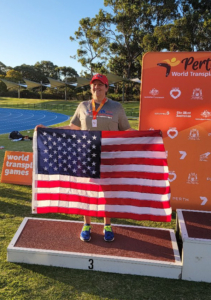 a person holding a US flag