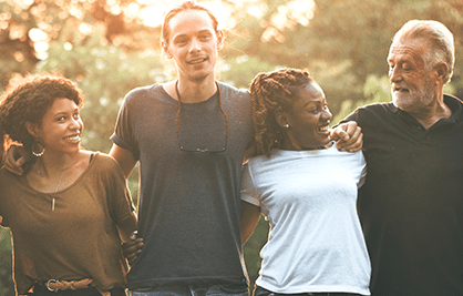 photo of 4 people smiling