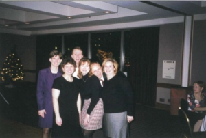 A group of people posing for a photo at an event