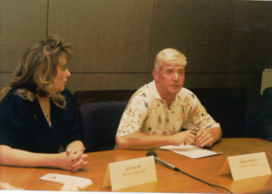 two people at a conference table