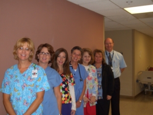 A group of medical professionals posing for a photo