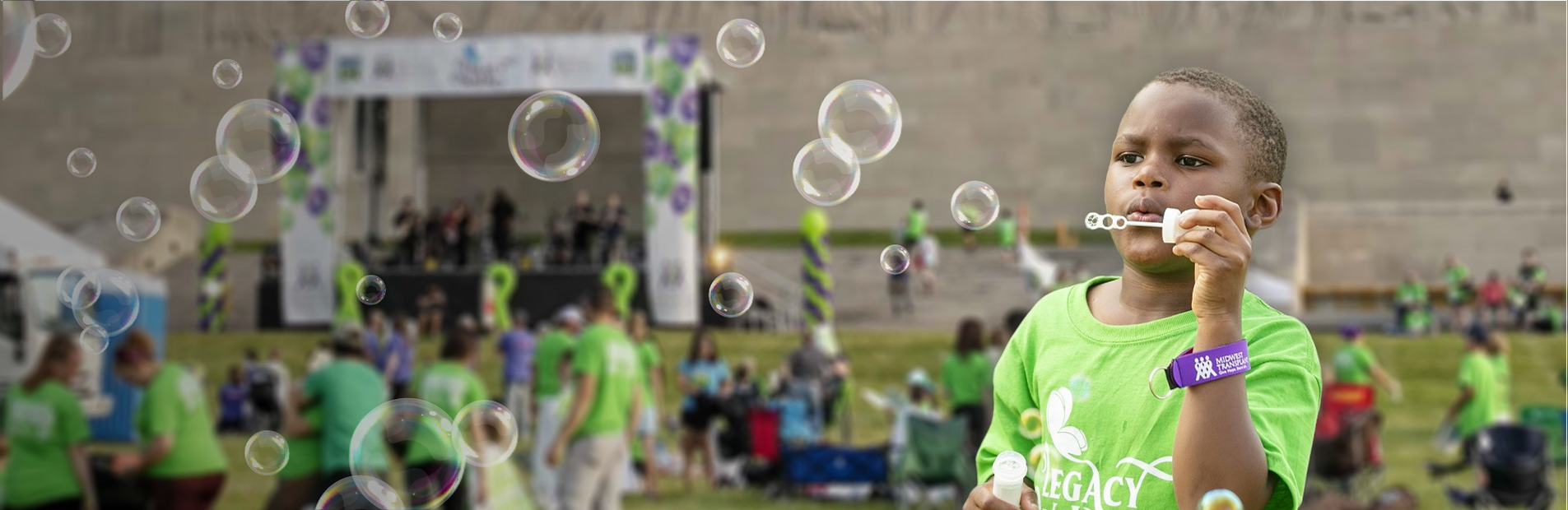 Little Boy at Legacy Walk blowing bubbles