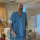 Scot Pollard at the hospital standing with a walker