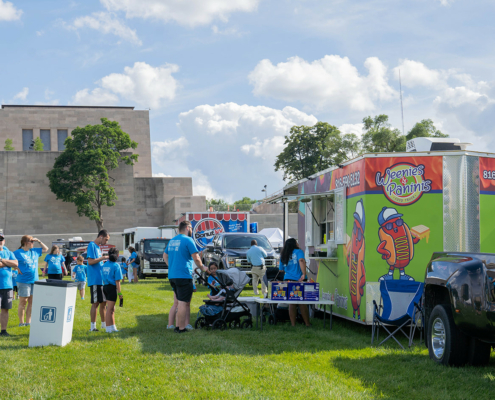 food truck on a grass field