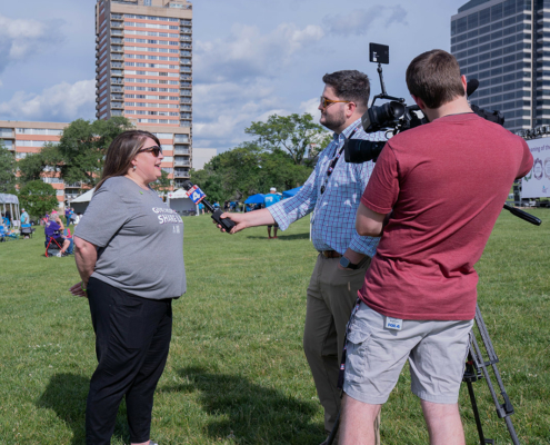 a person being interviewed on a field