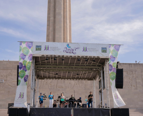 stage with band on a field