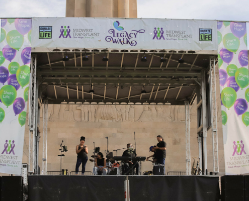 A band on an outdoor stage