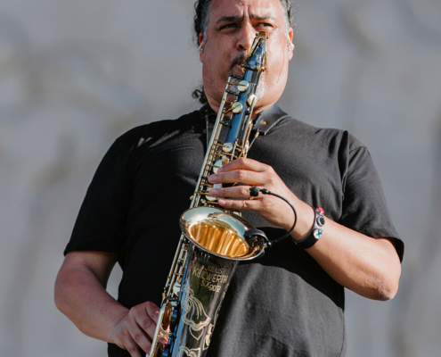 a musician playing a saxophone