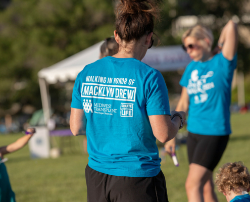 a person wearing a shirt that says walking in honor of Macklyn Drew