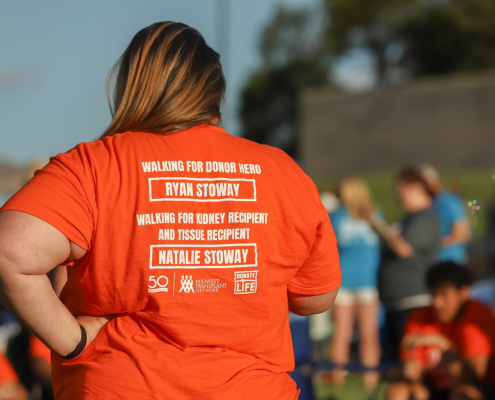 a person with a shirt that reads walking for donor hero Ryan Stoway. Walking for kidney recipient and tissue recipient Natalie Stoway