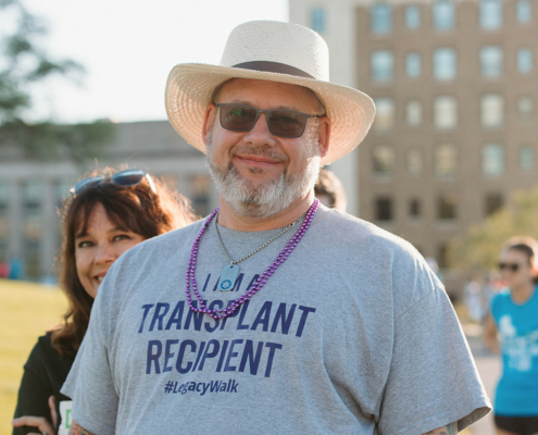 a person with a shirt that says transplant recipient