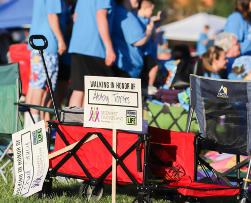 A sign that reads Walking in honor of Abby Torres