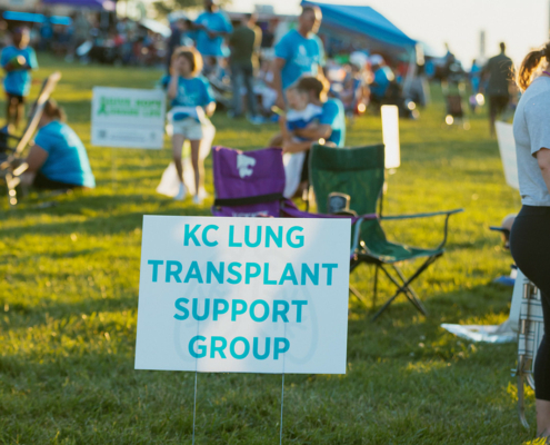 a sign that reads KC LUNG TRANSPLANT SUPPORT GROUP