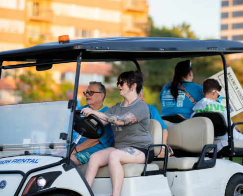 people in a golf cart