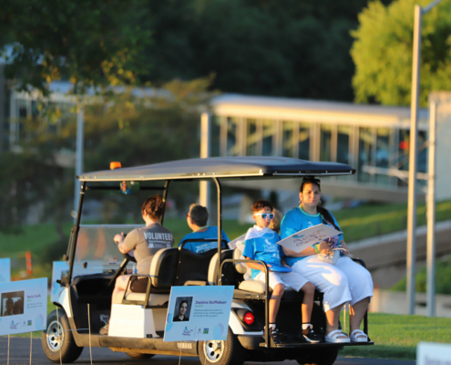 people in a golf cart